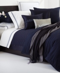 This Windsor Navy quilt from Hugo Boss turns your bed into an oasis of tranquility. 350-thread count cotton sateen and silk textures provide endless comfort. Zipper closure. This Windsor Navy quilt from Hugo Boss turns your bed into an oasis of tranquility. 350-thread count cotton sateen and silk textures provide endless comfort. Zipper closure.