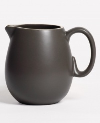 With a powdery matte finish and clean modern shapes, this dinnerware collection from renowned designer Vera Wang brings minimalism to the table with chic style. In soft, natural graphite, this creamer coordinates perfectly with any decor. With a powdery matte finish and clean modern shapes, this dinnerware collection from renowned designer Vera Wang brings minimalism to the table with chic style. In soft, natural graphite, this creamer coordinates perfectly with any decor.