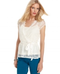Pretty lace and a wrap silhouette make up this charming petite top from NY Collection. (Clearance) Pretty lace and a wrap silhouette make up this charming petite top from NY Collection. (Clearance)