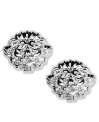 Wear with pride. These Anne Klein stud earrings flaunt their signature lion's head logo for a ferocious look. Crafted in silver tone mixed metal. Approximate diameter: 3/4 inch. Wear with pride. These Anne Klein stud earrings flaunt their signature lion's head logo for a ferocious look. Crafted in silver tone mixed metal. Approximate diameter: 3/4 inch.