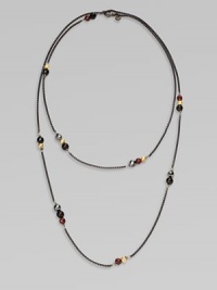 From the Black and Gold Chain Collection. A dramatically, long blackened sterling silver box chain with 18k gold, black onyx, hematite and garnet bead stations in various sizes; perfect for wearing doubled. Blackened sterling silver18k gold, black onyx, hematite and garnet beadsLength, about 40Lobster clasp closureImported 
