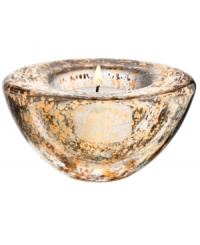 As good as gold, the Glimmer votive holder radiates holiday fun but dazzles all year long in heavy, shimmering glass. By Anna Ehrner for Kosta Boda. As good as gold, the Glimmer votive holder radiates holiday fun but dazzles all year long in heavy, shimmering glass. By Anna Ehrner for Kosta Boda.