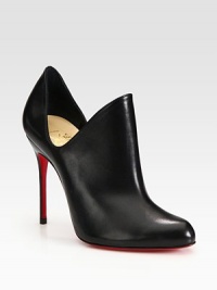 Edgy cutouts, skinny heel and signature red leather sole vitalize this Italian leather ankle boot. Self-covered heel, 4 (100mm)Leather upperPull-on styleLeather liningSignature red leather solePadded insoleMade in ItalyOUR FIT MODEL RECOMMENDS ordering one size up as this style runs small. Edgy cutouts, skinny heel and signature red leather sole vitalize this Italian leather ankle boot. Self-covered heel, 4 (100mm)Leather upperPull-on styleLeather liningSignature red leather solePadded insoleMade in ItalyOUR FIT MODEL RECOMMENDS ordering one size up as this style runs small.