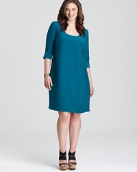 Rendered in luxe silk, this Melissa Masse Plus dress flaunts a rich hue and fluid silhouette for effortless elegance. Rendered in luxe silk, this Melissa Masse Plus dress flaunts a rich hue and fluid silhouette for effortless elegance.
