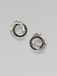 Sparkle in this white and black diamond accented 18k white gold design with interlocking rings. 18k white goldWhite and black diamonds, .42 tcwSize, about ½Post backMade in Italy Sparkle in this white and black diamond accented 18k white gold design with interlocking rings. 18k white goldWhite and black diamonds, .42 tcwSize, about ½Post backMade in Italy