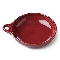 Inspired by discoveries in South America, DVF designs bakeware. Sized to chef's standards, deeply colored in DVF style and given a brilliant glaze, this oven-to-table collection is as decorative as it is functional. Safe to use in the oven and on the table. Stoneware with reactive glaze, knob in Riverstone shape.