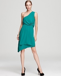 With soft, draped details, BCBGMAXAZRIA's one shoulder dress lends a vibrant look. With soft, draped details, BCBGMAXAZRIA's one shoulder dress lends a vibrant look.