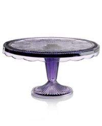 Past meets present. Feminine scalloped edges and raised medallions in beautifully hued glass make this Modern Vintage cake stand a standout at the table and on display. From the Godinger serveware collection. Past meets present. Feminine scalloped edges and raised medallions in beautifully hued glass make this Modern Vintage cake stand a standout at the table and on display. From the Godinger serveware collection.