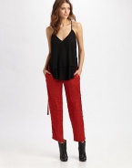 A fashion-forward, ankle-length style with edgy seaming at the knees and free-falling side straps.Hook-and-eye closureBelt loopsZip flyFront and back pocketsInseam, about 26Rise, about 9PolyesterDry cleanMade in USA of imported fabric Model shown is 5'10 (177cm) wearing US size 4. 