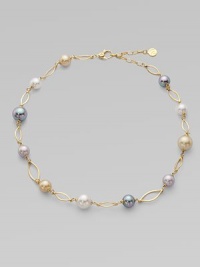 A gorgeous blend of different colored pearls with 18k goldplated sterling silver links. 10mm and 12mm round white, champagne, grey and black organic hand-made pearls 18k goldplated sterling silver Lobster clasp closure Length, about 16 to 18 adjustable Imported A gorgeous blend of different colored pearls with 18k goldplated sterling silver links. 10mm and 12mm round white, champagne, grey and black organic hand-made pearls 18k goldplated sterling silver Lobster clasp closure Length, about 16 to 18 adjustable Imported