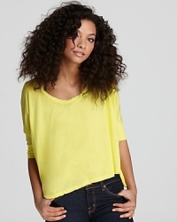 Electrify your off-duty line-up with this brightly hued Velvet by Graham & Spencer tee, cut in a cropped silhouette for modern flair. Electrify your off-duty line-up with this brightly hued Velvet by Graham & Spencer tee, cut in a cropped silhouette for modern flair.