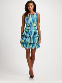 Colorful angled patterns give a playful twist to this crisp cotton/silk look with frilly ruffles around the skirt.Piped round neckline Piped arm openings Tiered ruffle skirt About 35 from shoulder to hem 70% cotton/30% silk Dry clean Imported Colorful angled patterns give a playful twist to this crisp cotton/silk look with frilly ruffles around the skirt.Piped round neckline Piped arm openings Tiered ruffle skirt About 35 from shoulder to hem 70% cotton/30% silk Dry clean Imported