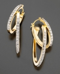 Interlocking hoops studded with a diamond accent set in 14k gold for a luxurious look. Interlocking hoops studded with a diamond accent set in 14k gold for a luxurious look.