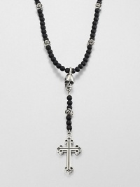 A traditional cross pendant is suspended from an impeccable strand of black onyx beads with sculpted skull detail for an edgy, modern update.Sterling silverBlack onyxLength about 26Toggle claspMade in USA