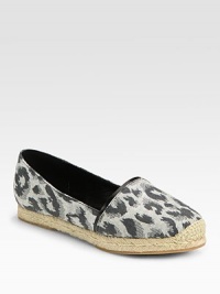 Leopard-print canvas with leather trim and a slight espadrille-inspired platform. Canvas upperLeather liningRubber solePadded insoleImportedOUR FIT MODEL RECOMMENDS ordering true size. Leopard-print canvas with leather trim and a slight espadrille-inspired platform. Canvas upperLeather liningRubber solePadded insoleImportedOUR FIT MODEL RECOMMENDS ordering true size.