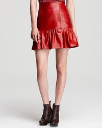 A Nanette Lepore leather skirt is fashioned with a drop-waist and ruffle hem for effortless femininity with a playful flair. A Nanette Lepore leather skirt is fashioned with a drop-waist and ruffle hem for effortless femininity with a playful flair.