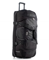 Get geared up! A drop bottom compartment and divider panel give this duffel true travel cred, providing all of the space and amenities to master the art of organization. Hold down straps, exterior compression straps and two zippered top loading compartments perfect packing for you. 5-year warranty. Get geared up! A drop bottom compartment and divider panel give this duffel true travel cred, providing all of the space and amenities to master the art of organization. Hold down straps, exterior compression straps and two zippered top loading compartments perfect packing for you. 5-year warranty.