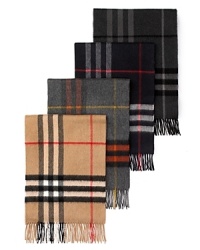 Soft, woven cashmere muffler with fringe in iconic check pattern. Soft, woven cashmere muffler with fringe in iconic check pattern.