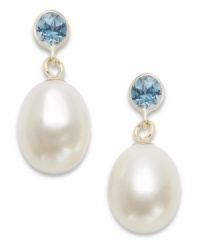 Polish, shine & poise. These glam drop earrings highlight cultured freshwater pearls (8-1/2-9mm) and round-cut blue topaz in a stud backing (5/8 ct. t.w.). Earrings crafted in 14k gold. Approximate drop: 3/4 inch. Polish, shine & poise. These glam drop earrings highlight cultured freshwater pearls (8-1/2-9mm) and round-cut blue topaz in a stud backing (5/8 ct. t.w.). Earrings crafted in 14k gold. Approximate drop: 3/4 inch.