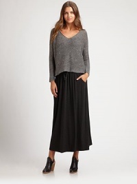 Luxurious Italian fabrication combines flawlessly with this cropped silhouette to create a dolman design with a hint of sparkle.V-neckDolman sleevesPull-on styleAbout 21 from shoulder to hemViscose/nylon/alpaca/metallic thread/woolDry cleanImported of Italian fabric Model shown is 5'11 (180cm) wearing a US size Small. 