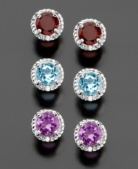 Fill your look with fabulous color. This three pair set by Victoria Townsend includes sterling silver stud earrings featuring round-cut blue topaz (2 ct. t.w.), round-cut garnet ( 2 ct. t.w.) and round-cut amethyst (1-3/8 ct. t.w.). Fill your look with fabulous color. This three pair set by Victoria Townsend includes sterling silver stud earrings featuring round-cut blue topaz (2 ct. t.w.), round-cut garnet ( 2 ct. t.w.) and round-cut amethyst (1-3/8 ct. t.w.).