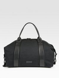 Subtle yet stylish carryall for the modern man of style, finely crafted in cotton canvas with genuine leather trim.Zip closureTop handlesAdjustable shoulder strapFully linedCanvas18W x 14H x 9DImported Subtle yet stylish carryall for the modern man of style, finely crafted in cotton canvas with genuine leather trim.Zip closureTop handlesAdjustable shoulder strapFully linedCanvas18W x 14H x 9DImported
