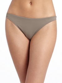 THE LOOKMedium coverageElastic waist and leg openingsTHE MATERIAL80% nylon/20% spandexFully linedCARE & ORIGINHand washMade in USAPlease note: Bikini top sold separately. THE LOOKMedium coverageElastic waist and leg openingsTHE MATERIAL80% nylon/20% spandexFully linedCARE & ORIGINHand washMade in USAPlease note: Bikini top sold separately.
