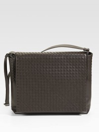 Classic crossbody design crafted in iconic smooth woven leather.Flap closureAdjustable shoulder strapInterior zip, cell phone and PDA pocketFully lined19½W x 12¼H x 5¼DMade in Italy Classic crossbody design crafted in iconic smooth woven leather.Flap closureAdjustable shoulder strapInterior zip, cell phone and PDA pocketFully lined19½W x 12¼H x 5¼DMade in Italy
