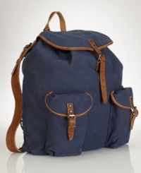 Taking a cue from vintage hiking bags, a rugged canvas backpack is accented with leather trim and multiple pockets for stylish stowing. Taking a cue from vintage hiking bags, a rugged canvas backpack is accented with leather trim and multiple pockets for stylish stowing.