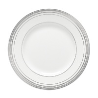 World-renowned fashion designer Monique Lhuillier collaborated with Waterford to create this fine bone china dinnerware collection. Drawing inspiration from the artful details that finish Lhuillier's brilliant couture bridal gowns, each piece in the assortment is decorated with polished platinum accents in a raised stitching design. World-renowned fashion designer Monique Lhuillier collaborated with Waterford to create this fine bone china dinnerware collection. Drawing inspiration from the artful details that finish Lhuillier's brilliant couture bridal gowns, each piece in the assortment is decorated with polished platinum accents in a raised stitching design.