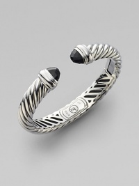 From the Waverly Collection. Cable twisted sterling silver with faceted onyx end caps.Black onyx Sterling silver Width, about 10mm x 5mm Hinge closure Imported From the Waverly Collection. Cable twisted sterling silver with faceted onyx end caps.Black onyx Sterling silver Width, about 10mm x 5mm Hinge closure Imported