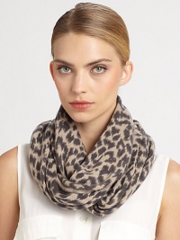An endless design crafted of luxurious cashmere with a fierce animal print. Cashmere12 X 26½ loopDry cleanImported