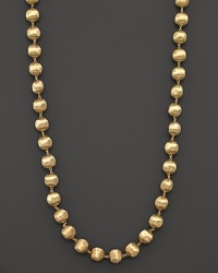 Hand engraved beaded necklace in 18K yellow gold from Marco Bicego's Africa collection.