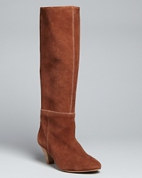 Long and tall with Western spirit, these Cynthia Vincent pointed toe boots combine cowgirl influences with '70s style. Long and tall with Western spirit, these Cynthia Vincent pointed toe boots combine cowgirl influences with '70s style.