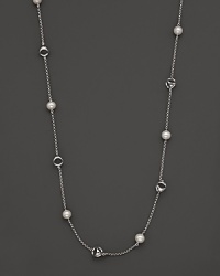 This bold sterling silver necklace, gleaming with freshwater pearls, is a brilliant showcase for Di MODOLO's iconic Triadra design. This bold sterling silver necklace, gleaming with freshwater pearls, is a brilliant showcase for Di MODOLO's iconic Triadra design.