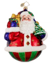 Have a holly jolly Christmas with this lovely, hand-painted ornament from Christopher Radko, featuring St. Nick or a cheerful snowman holding a gift and Christmas tree, both classic symbols of the season. Finished with a dusting of glitter for an extra spark. Have a holly jolly Christmas with this lovely, hand-painted ornament from Christopher Radko, featuring St. Nick or a cheerful snowman holding a gift and Christmas tree, both classic symbols of the season. Finished with a dusting of glitter for an extra spark.