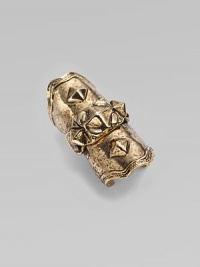 A piece of armor in goldplated metal with pyramid studding for a bold, edgy statement.14K goldplated Center hinge Diameter, about 20mm, (.78) Length, about 2 Made in USA Additional Information Women's Ring Size Guide 