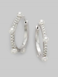 Classic 18K white gold hoops with diamonds and cultured pearl accents.3.5mm cultured pearl Diamond, 0.3 tcw 18K white gold Pierced Imported Classic 18K white gold hoops with diamonds and cultured pearl accents.3.5mm cultured pearl Diamond, 0.3 tcw 18K white gold Pierced Imported