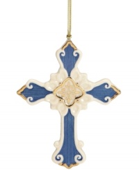 Be reminded of the meaning of Christmas with this cross ornament from Lenox, crafted of lovely porcelain with blue and gold embellishments. With gold hanging thread. Be reminded of the meaning of Christmas with this cross ornament from Lenox, crafted of lovely porcelain with blue and gold embellishments. With gold hanging thread.