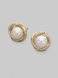 From the Infinity Collection. Two elegant, intertwined bands of 18k yellow gold surround an exquisite, naturally hued pearl. 6mm white pearls 18k yellow gold Diameter, about ½ Post back Imported From the Infinity Collection. Two elegant, intertwined bands of 18k yellow gold surround an exquisite, naturally hued pearl. 6mm white pearls 18k yellow gold Diameter, about ½ Post back Imported