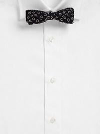 A dapper design in smooth silk with a distinct horseshoe print.About 4 wideSilkDry cleanMade in USA A dapper design in smooth silk with a distinct horseshoe print.About 4 wideSilkDry cleanMade in USA