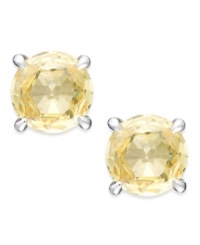 Simply elegant. Arabella's stud earrings sparkle with round-cut yellow Swarovski zirconias for a vibrant touch. Set in sterling silver. Approximate diameter: 1/3 inch.