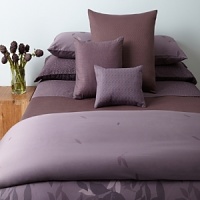 A color coordinated bedskirt in textured cotton complements the ELM collection. A color coordinated bedskirt in textured cotton complements the ELM collection.