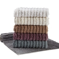 Ribbed bath rug in assorted colors. Ribbed bath rug in assorted colors.