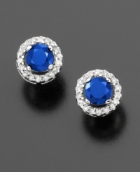 Vibrant, round-cut sapphires (5/8 ct. t.w.) are nestled within the sparkle of round-cut diamonds (1/10 ct. t.w.) for a truly luxurious look. Set in 14k white gold. Vibrant, round-cut sapphires (5/8 ct. t.w.) are nestled within the sparkle of round-cut diamonds (1/10 ct. t.w.) for a truly luxurious look. Set in 14k white gold.