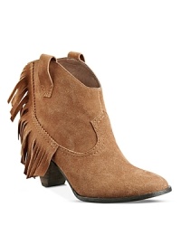 Wildly appealing, these GUESS booties are a get-noticed, flirty take on the Western trend. Wildly appealing, these GUESS booties are a get-noticed, flirty take on the Western trend.