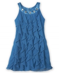 Let the ruffles run. Fun, floaty corkscrew details on this dress from BCX make it the perfect outfit to complement her party girl style. Let the ruffles run. Fun, floaty corkscrew details on this dress from BCX make it the perfect outfit to complement her party girl style.