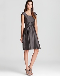 Classic elegance is simple with this Armani Collezioni taffeta dress. Complement the luxe sheen with embellished heels and sparkling accessories. Classic elegance is simple with this Armani Collezioni taffeta dress. Complement the luxe sheen with embellished heels and sparkling accessories.