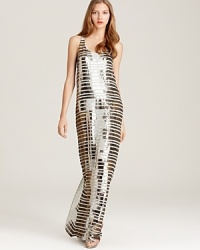 Gilded in sparkling sequins, this glamorous BCBGMAXAZRIA maxi dress touts side pockets for an unexpected casual edge. Gilded in sparkling sequins, this glamorous BCBGMAXAZRIA maxi dress touts side pockets for an unexpected casual edge.