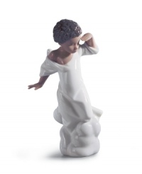 Hark! A special angel from Lladro watches over your friends and family, gazing down from the clouds in handcrafted porcelain. Hark! A special angel from Lladro watches over your friends and family, gazing down from the clouds in handcrafted porcelain.